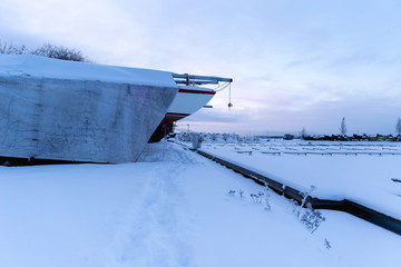 Sailing boats by the sea shore in the winter time