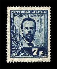 Popov Alexandr (1859-1905), famous russian radio pioneer, wireless transmission innovator, circa 1925. vintage canceled post stamp printed in the USSR isolated on black background. 