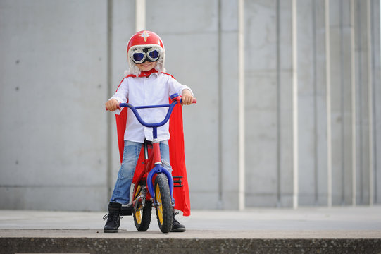 A funny, little superhero. Concept boy imagination. Happy childhood.
