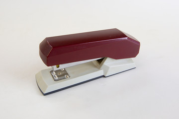 red stapler isolated on white background