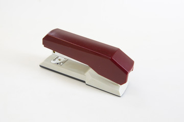 red stapler isolated on white background