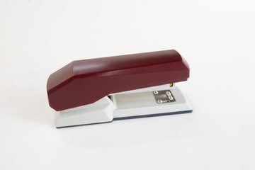 red stapler isolated on white background