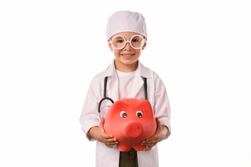 A  little, smiling boy doctor in  medical uniform, isolated on white, with stethoscope on the neck,  reminds you about health care and healthy lifestyle. Waist up portrait, looking at camera.