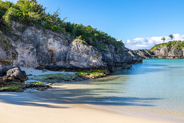 A pretty cove on the island of Bermuda, with a blue sky overhead