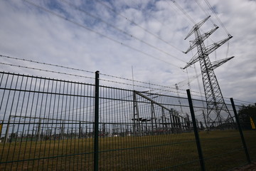 electricity pylons at sunset