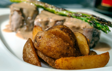 Sirloin with pepper and potatoes served on a plate