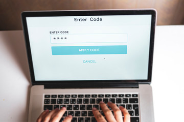 person enter security code on his device b
