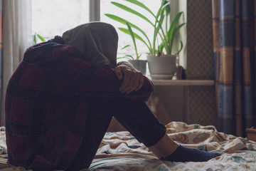 sad lonely teenager having trouble and cry in bedroom b - obrazy, fototapety, plakaty