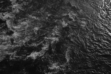 Wild white water river flowing rapids