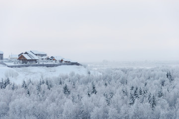 Fototapeta na wymiar Country winter landscape in North Russia