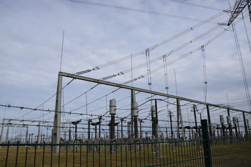 electricity pylons at sunset