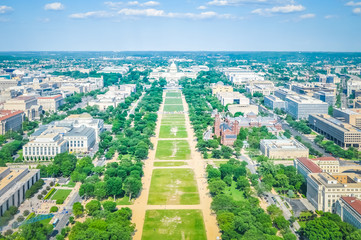 Aerial view of Washington DC skyline with the United State Capitol, National Mall and Smithsonian Museums from the Washington Monument.