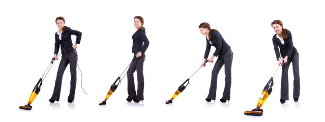 Young woman with vacuum cleaner on white