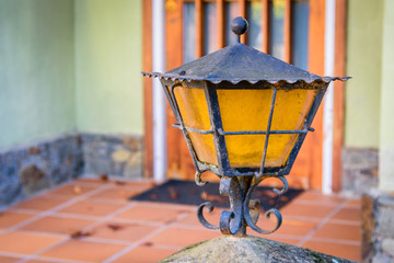 Fototapeta na wymiar Beautiful street lamp in the front door.