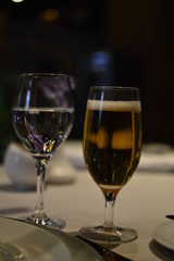 glass of beer on wooden table