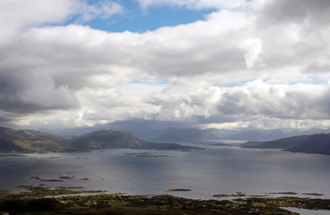 Mountains by the sea in Lofoten, Norway on a cloudy day