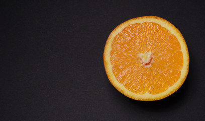 orange fruit dark background