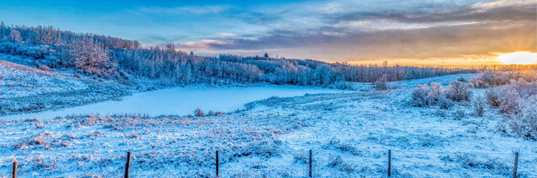 Winter Solstice Sunset over Gorgeous Frost Covered Trees and Pond
