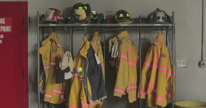 Firefighter gear hanging in fire station