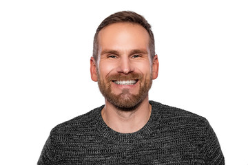 Obraz premium Portrait of a young attractive man with a beard on a white background.