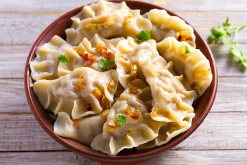 Dumplings, filled with potato. Varenyky, vareniki, pierogi, pyrohy - dumplings with filling