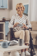 Positive delighted invalid woman being at home
