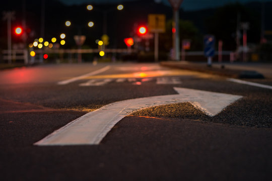 Road marking for a right hand turn in New Zealand at night