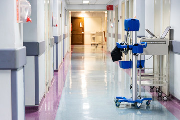 Mobile health diagnostic instrument at corridor of hospital ward - obrazy, fototapety, plakaty