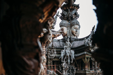 Sanctuary of Truth is a temple construction in Pattaya, Thailand. The sanctuary is an all-wood building filled with sculptures based on traditional Buddhist and Hindu motifs.