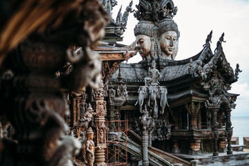 Sanctuary of Truth is a temple construction in Pattaya, Thailand. The sanctuary is an all-wood building filled with sculptures based on traditional Buddhist and Hindu motifs.