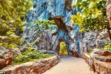 Door in the rock. Portal concept