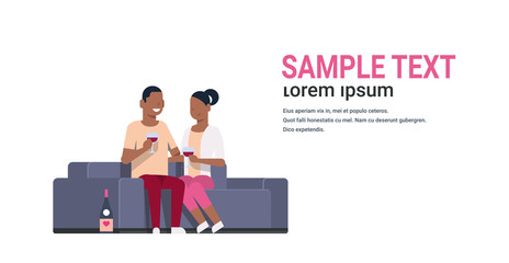 Obraz premium african american couple drinking wine man woman lovers sitting on couch happy valentines day holiday celebration concept flat horizontal isolated copy space vector illustration