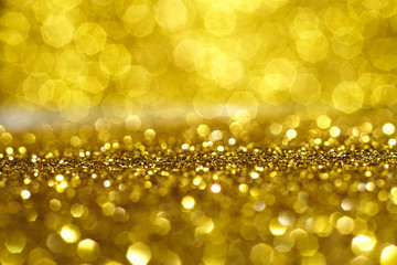 gold and white glitter abstract bokeh background Christmas	