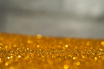 gold and white glitter abstract bokeh background Christmas	