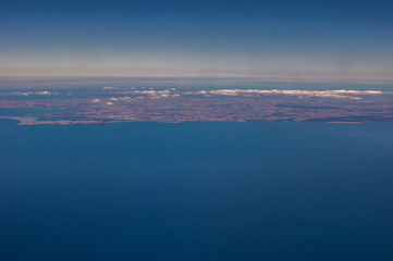 Flying over The Great Australian Bight provides glimpses of the coastline and nearby islands