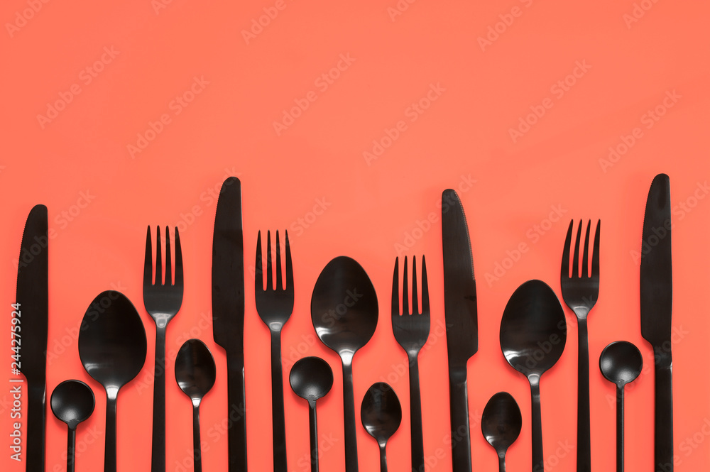 Poster Set of black steel cutlery