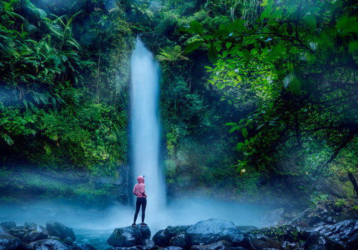 Woman enjoying scenery of Sawer waterfalls