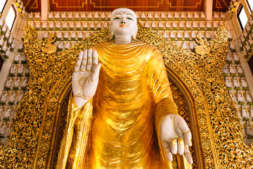 Buddha statues in the Dhammikarama Burmese Buddhist Temple,and it is situated along Burma Lane in...