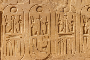 Ancient egyptian hieroglyphs on the wall in Karnak Temple Complex in Luxor, Egypt