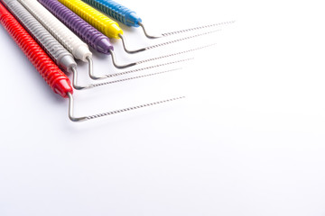 Naklejka premium Endodontic instruments. Dental instruments for tooth canal cleaning. Tooth canal cleaning device.