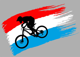 The contour of the cyclist on the flag of Luxembourg