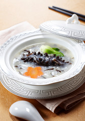 Delicious Chinese cuisine, black rice sea cucumber porridge