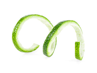 Peel of fresh ripe lime on white background