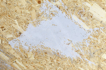 The texture of the OSB material is a plate of recycled compressed wood chips, to which a large...