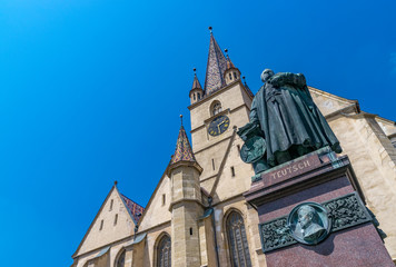 Fototapeta na wymiar Lutheran Cathedral of Saint Mary on a beautiful sunny summer day in Sibiu, Transylvania region, Romania