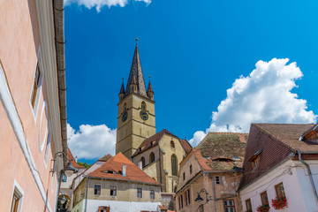 Fototapeta na wymiar Lutheran Cathedral of Saint Mary on a beautiful sunny summer day in Sibiu, Transylvania region, Romania