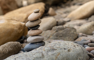 Fototapeta na wymiar Balanced Pebbles on Rocks