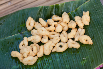 Delicious Asia, Asian eating food. Frying mini Chinese Churros or Chinese Donut with soy milk for breakfast menu. ( Thai name is Patongko ). Chinese Doughnuts Popular breakfast served with soy milk.