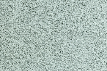 wall. plaster applied to it. composition of small stones. and in a special way pounded