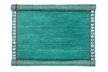 Fototapeta premium Jeans frame folded in the form of manuscripts,encrusted with white rhinestones, isolated on white background.